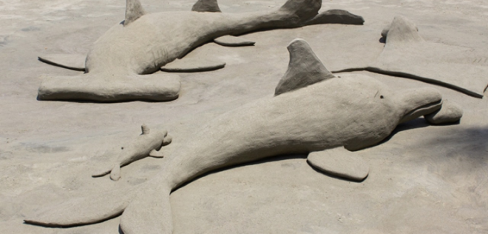 Arte em areia decora Praia de Barequeçaba